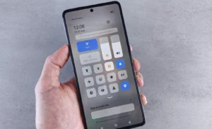 A user navigating the settings on their Android smartphone to adjust connectivity options like Wi-Fi, Bluetooth, and location services.